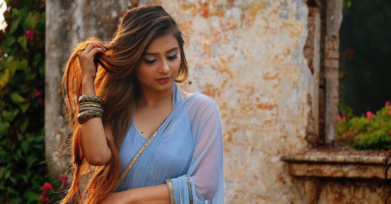 Style - Photo of Woman Wearing Blue Dress