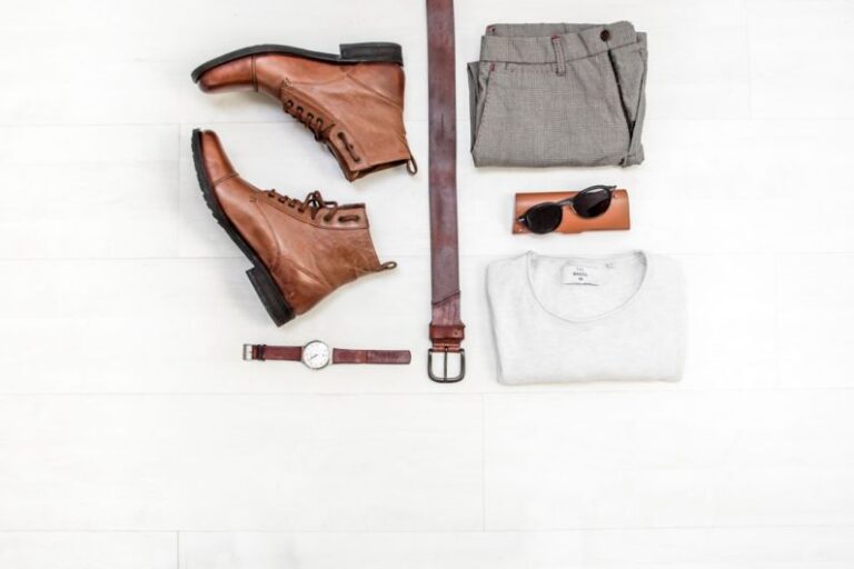Outfit - pair of brown leather boots beside bet