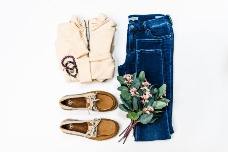 Outfit - brown leather boots beside blue denim jeans