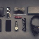 Accessories - black corded headphones near eyeglasses