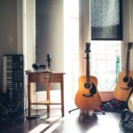 Music - several guitars beside of side table