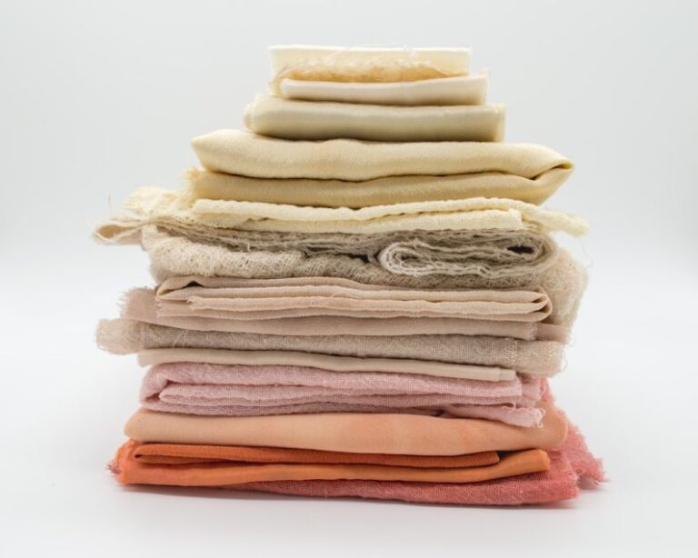 Fabric - pile of cloth on white surface