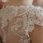 Wedding Dress - woman wearing white sheer lace wedding gown