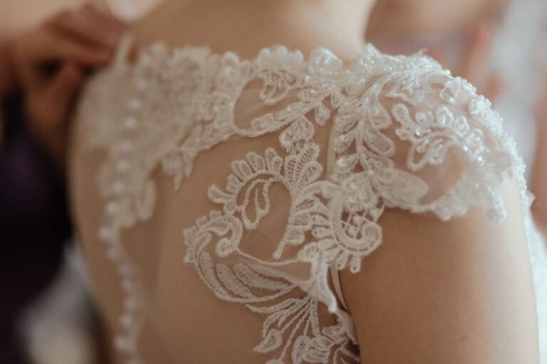 Wedding Dress - woman wearing white sheer lace wedding gown