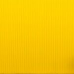 Monochrome Dress - woman wearing black top standing near yellow wall