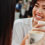 Best Coffee Shops - Cheerful Asian women drinking coffee in outdoor cafeteria