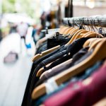 Luxury Second-hand - selective focus photography of hanged clothes