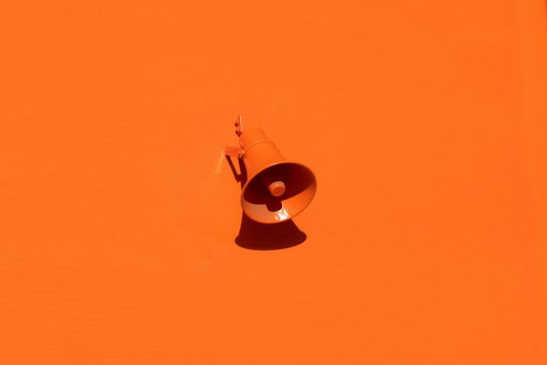 Color Trends - orange megaphone on orange wall