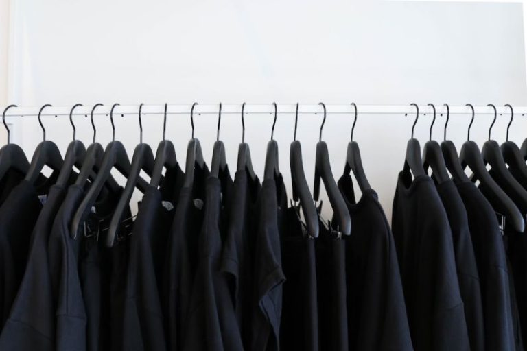 Oversized Trend - black clothes hanged in rack
