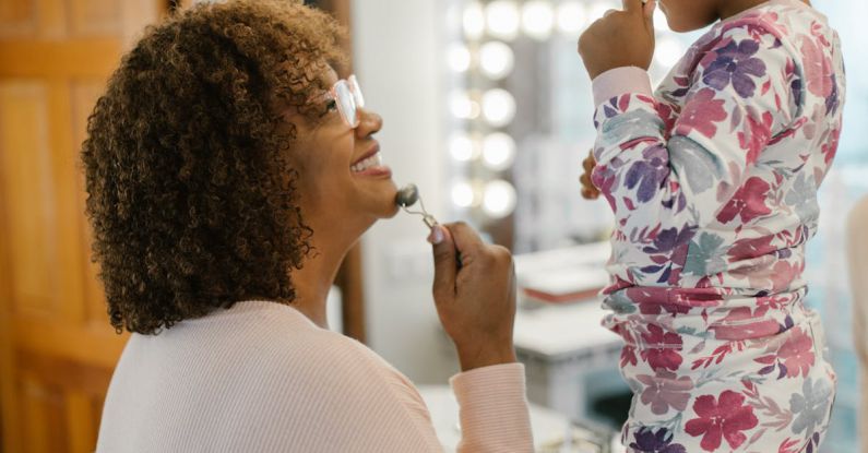 Nighttime Skincare - Mother and Daughter Using Jade Roller