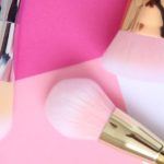 Minimalist Makeup - Makeup Brush Set over a Pink Surface