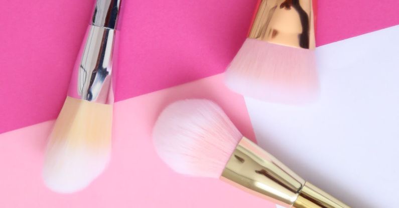 Minimalist Makeup - Makeup Brush Set over a Pink Surface