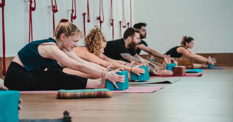 Yoga Retreats - Group Stretching on Mats