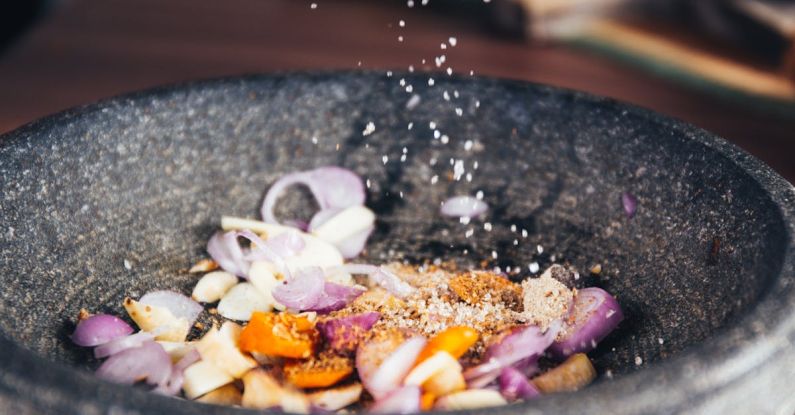 Plant-based Recipes - Person Pouring Salt in Bowl
