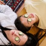 DIY Spa Day - Girl in White Shirt Lying on Brown Textile