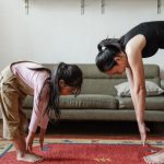Healthy Living Inspiration - Photo of Woman and Girl Stretching Their Body