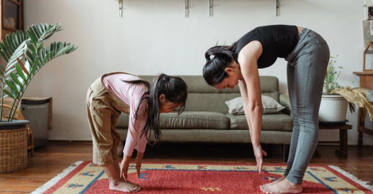 Healthy Living Inspiration - Photo of Woman and Girl Stretching Their Body
